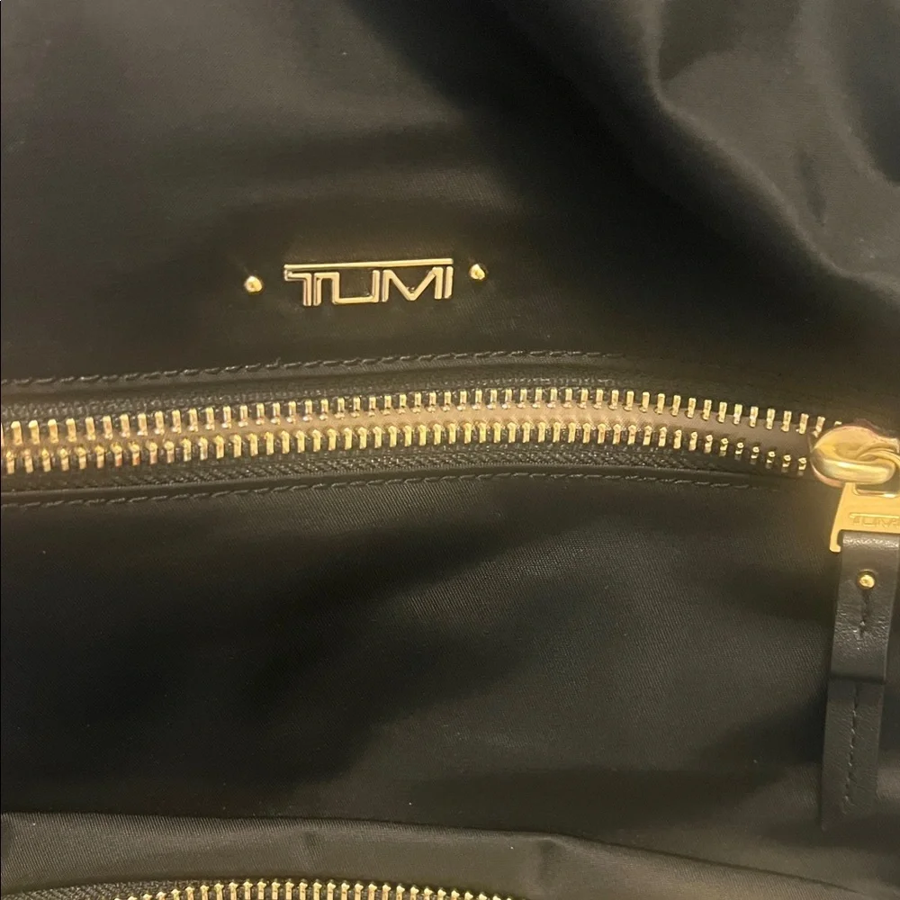 Tumi Halle Black Backpack with Gold Accents